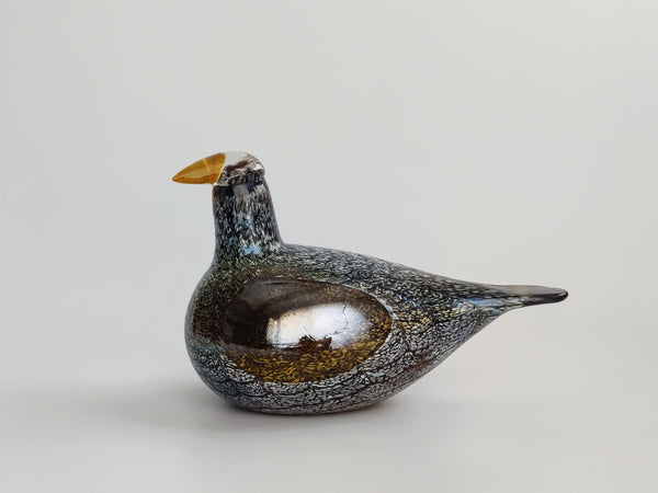 Glass bird figurine on a light gray background design Oiva Toikka